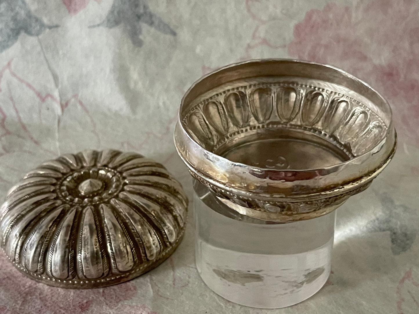 An antique silver south East Asian round box with lid