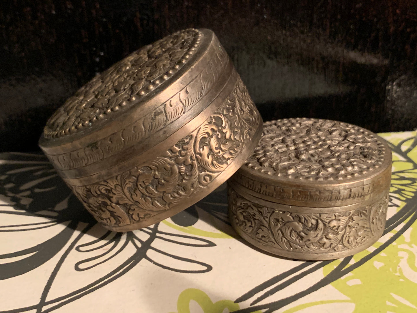 Two metal pill boxes