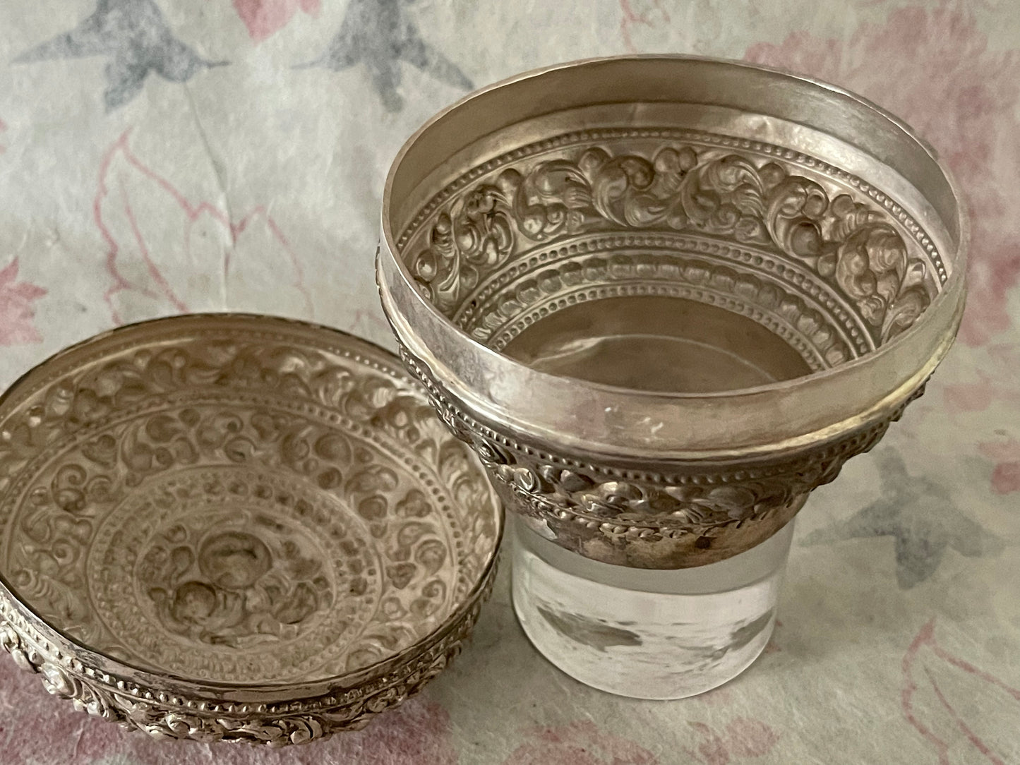 An antique silver south East Asian round box with lid