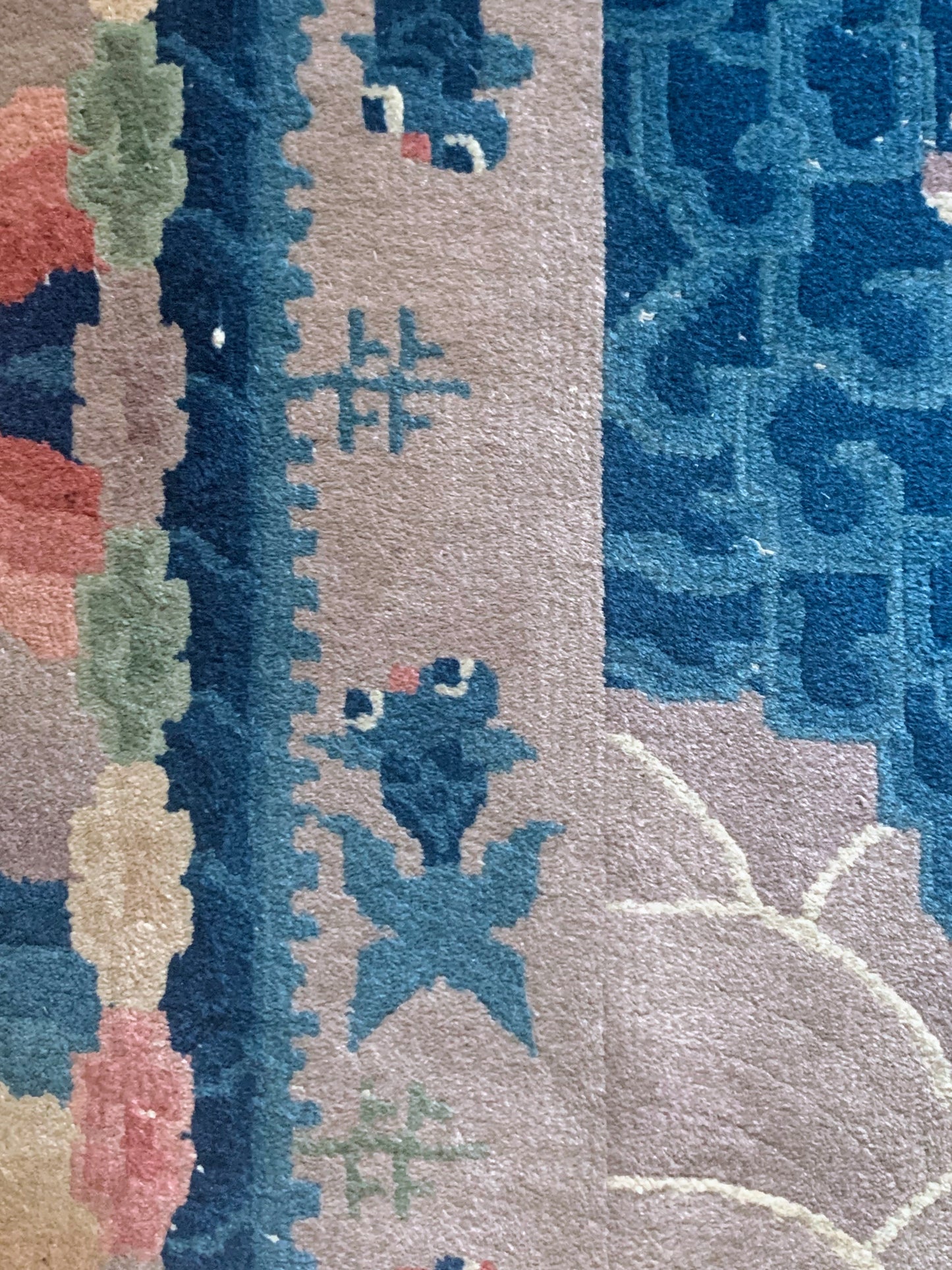An antique Chinese dragon rug