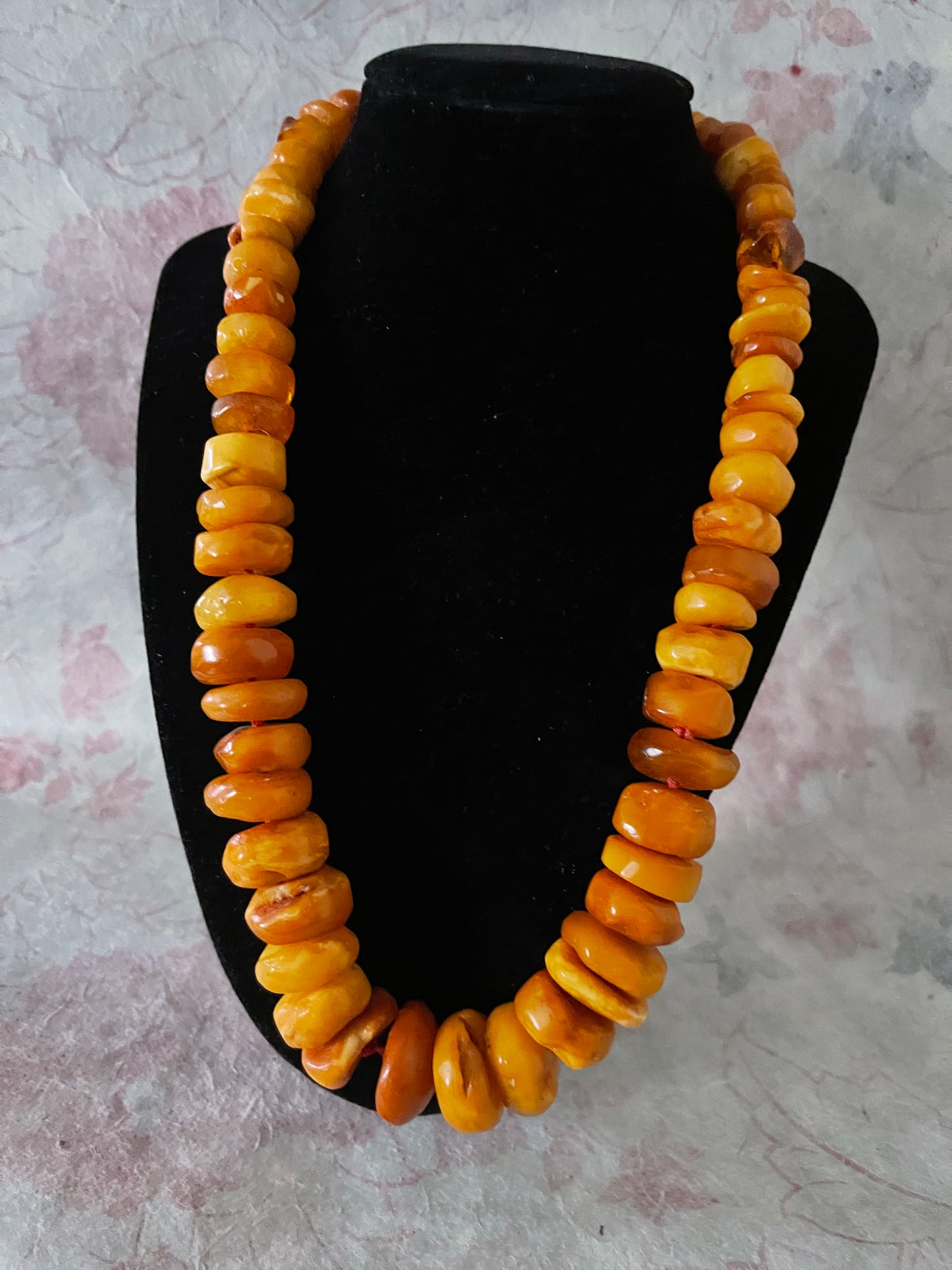 A vintage butterscotch amber bead necklace