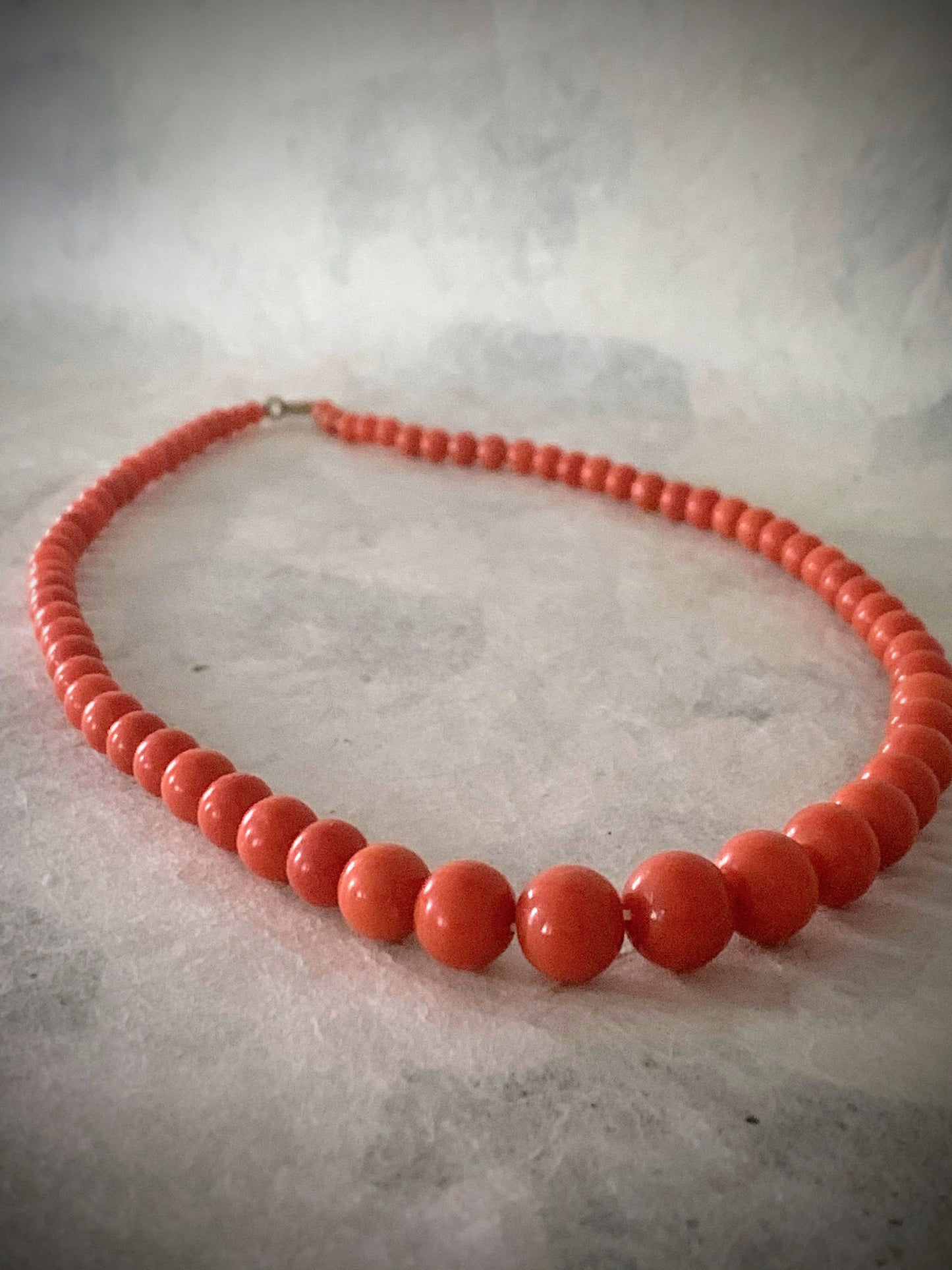 A 16” long antique coral necklace