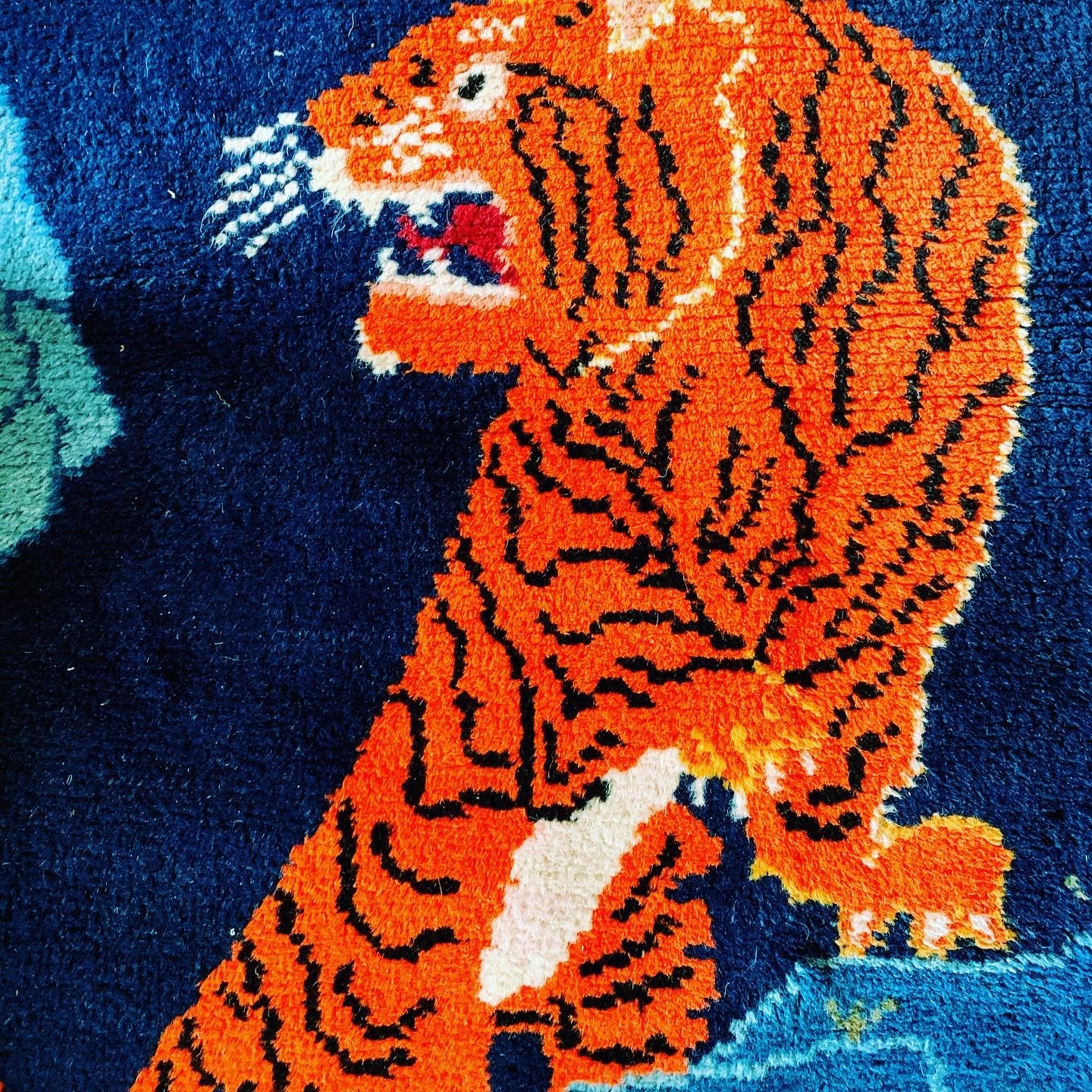 A vintage Tibetan Tiger carpet