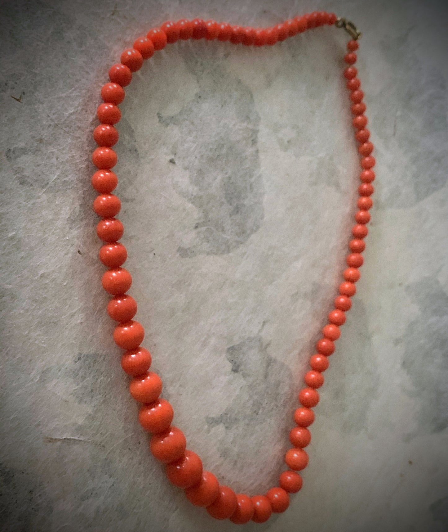 A 16” long antique coral necklace
