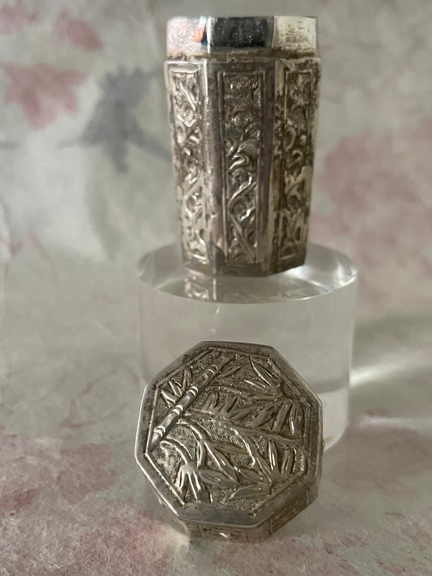 An antique octagonal shaped silver box with lid from south east Asia.