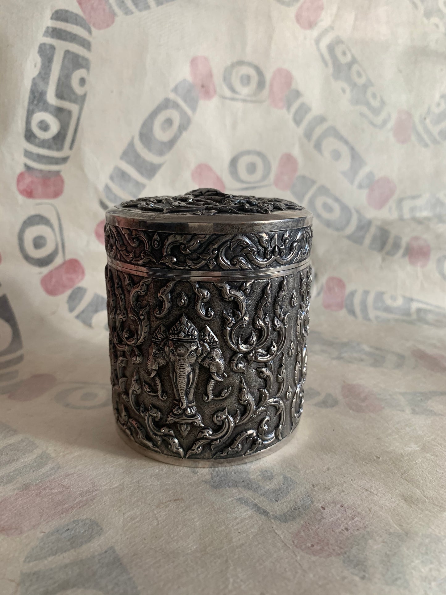 An antique cylindrical Thai silver box