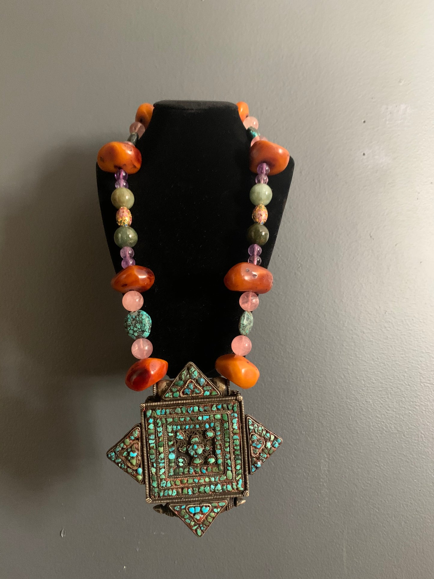 A vintage Tibetan ghau necklace
