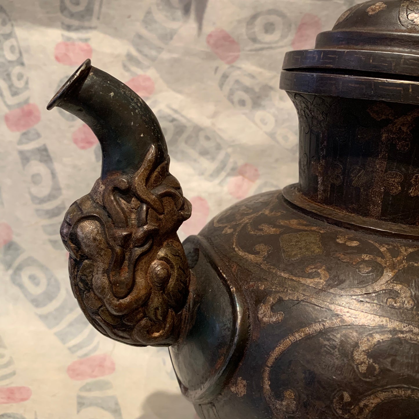An antique Tibetan iron and silver teapot
