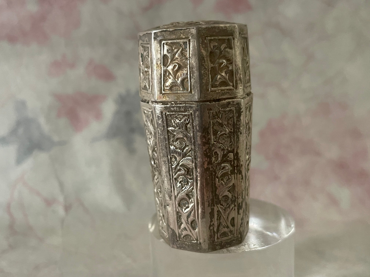An antique octagonal shaped silver box with lid from south east Asia.