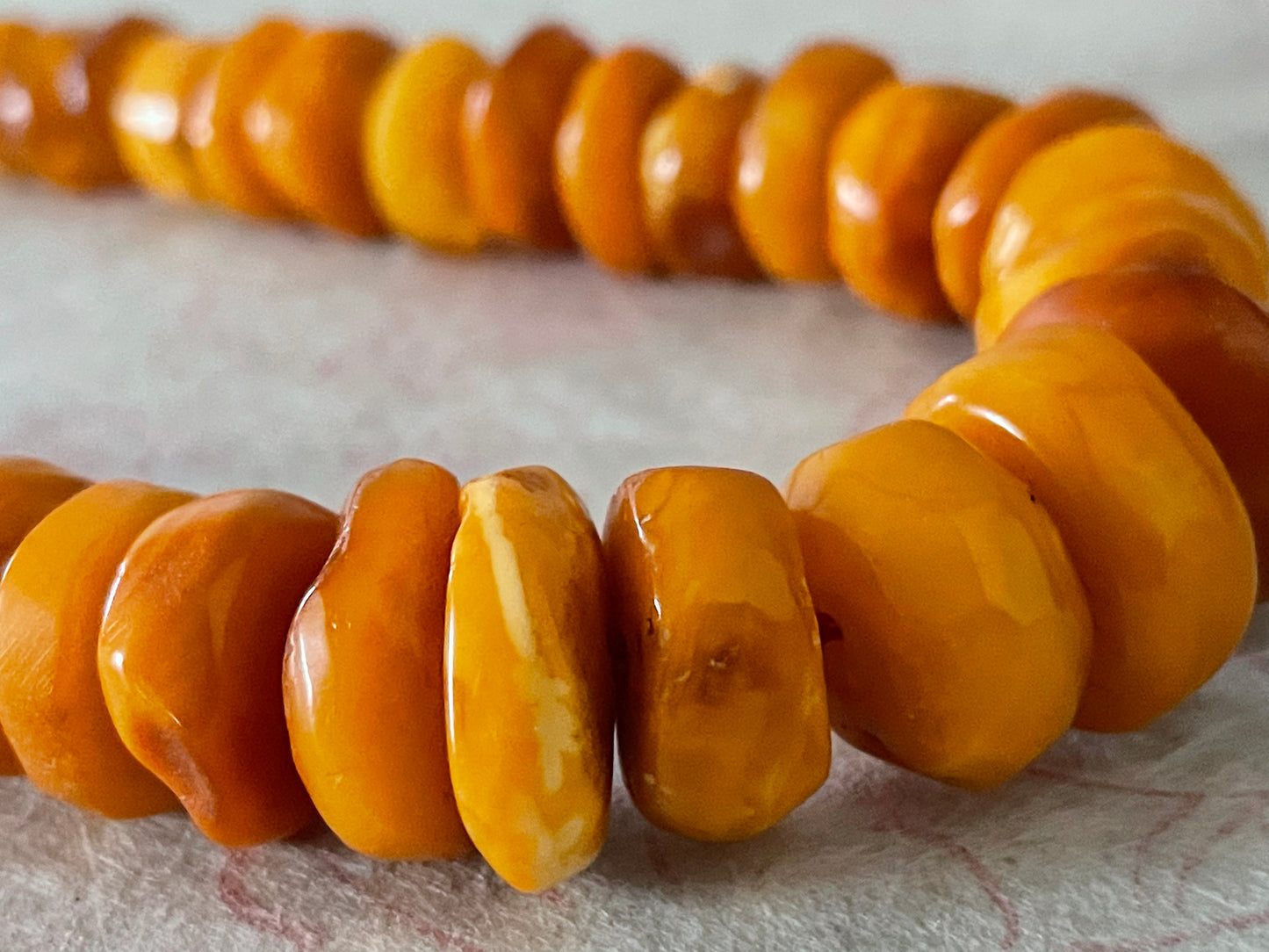 A vintage butterscotch amber bead necklace