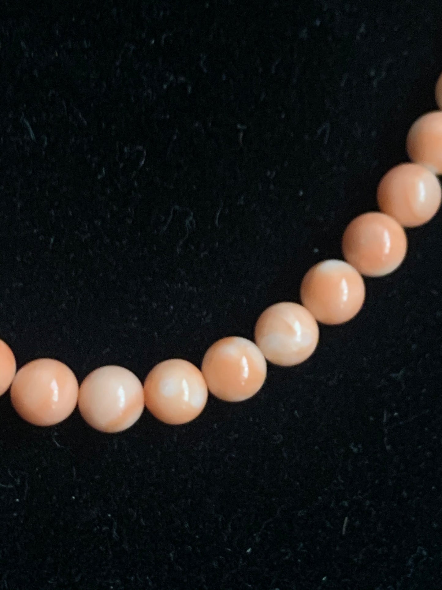 A salmon color coral necklace