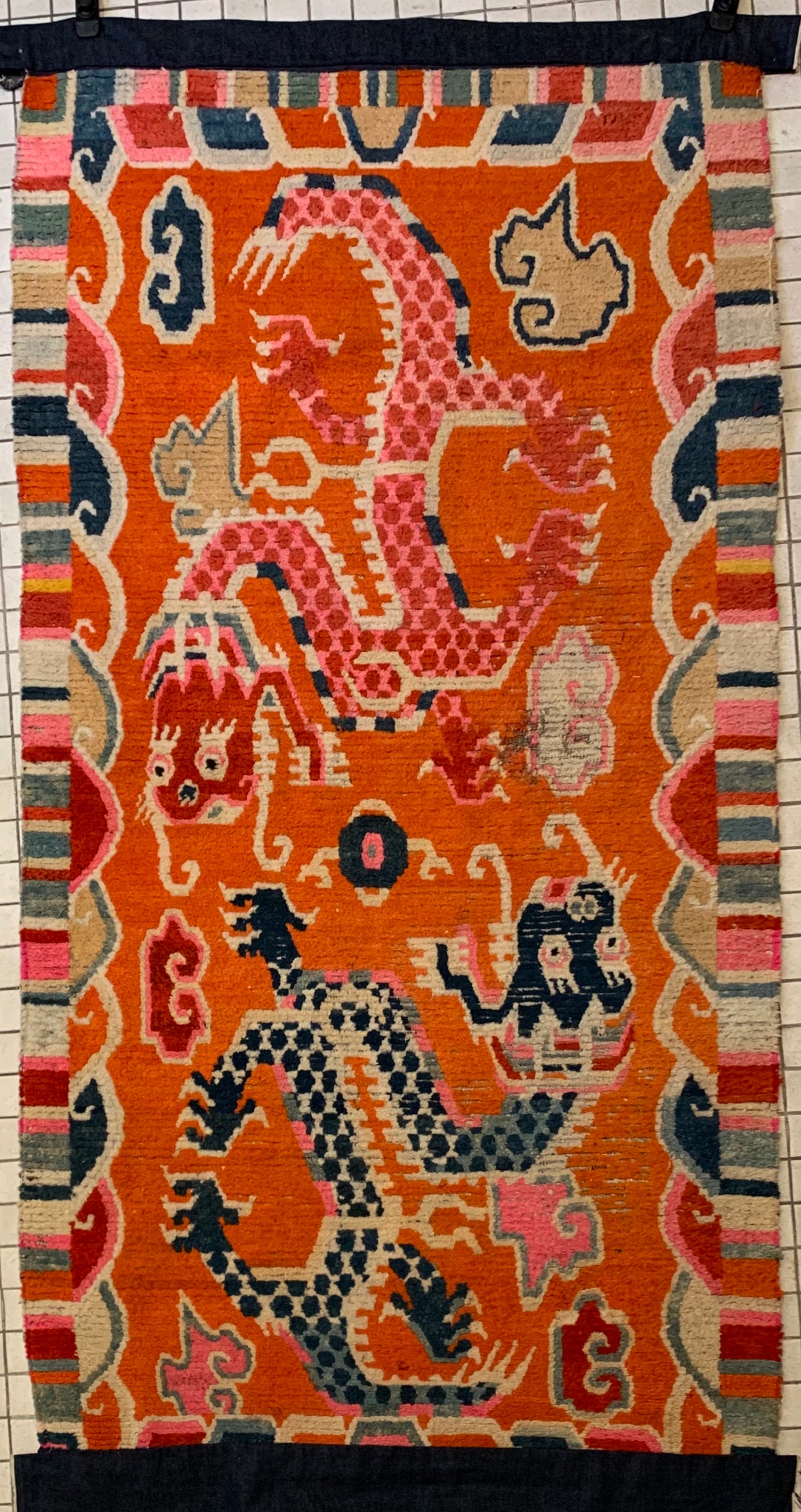 A 19th C., unique antique Tibetan dragon rug