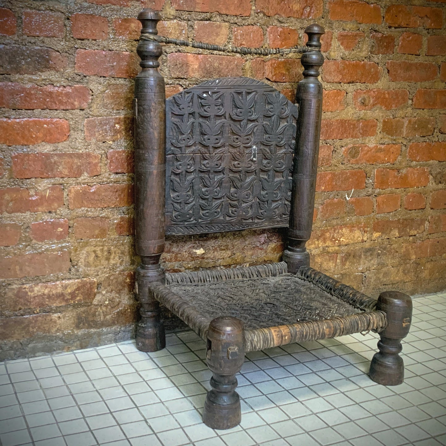 Low antique Indian chair