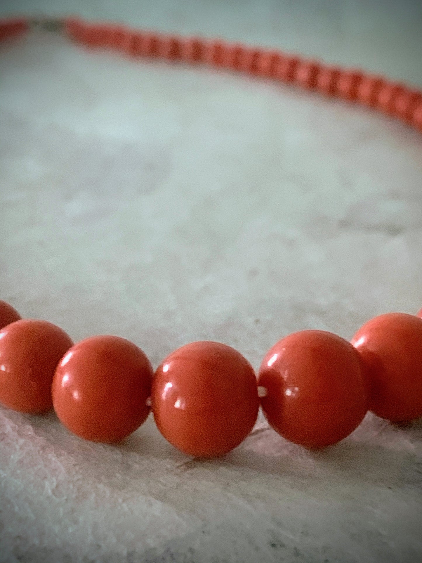 A 16” long antique coral necklace