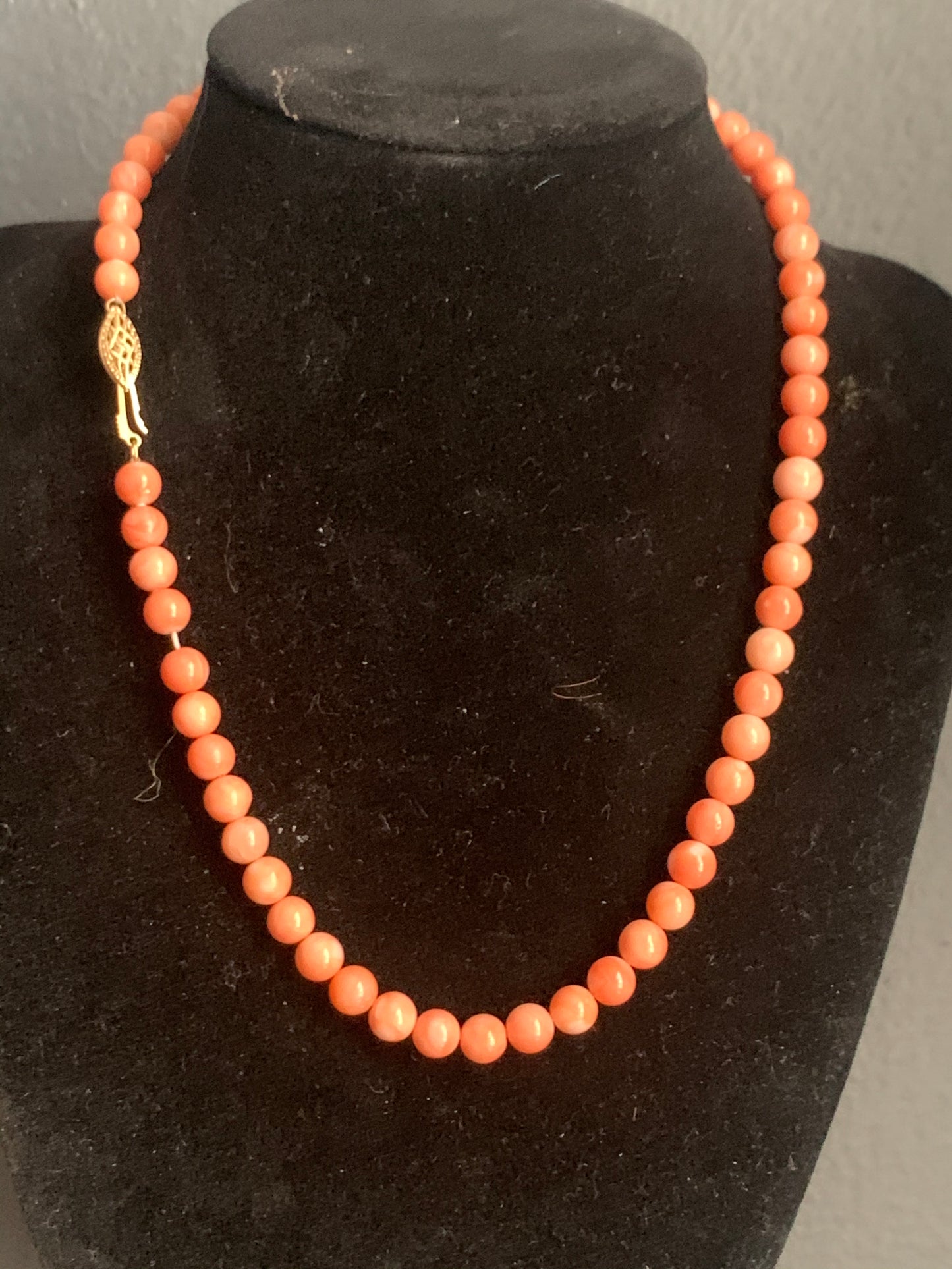 A salmon color coral necklace