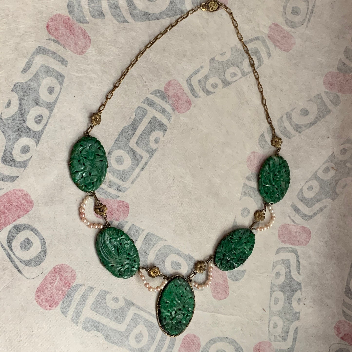 A spinach green jade necklace