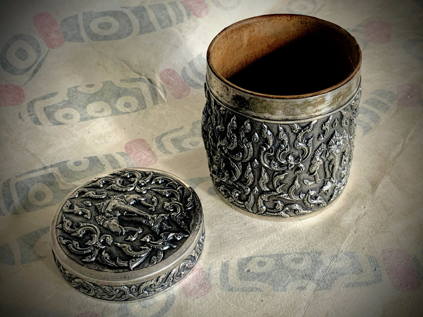 An antique cylindrical Thai silver box