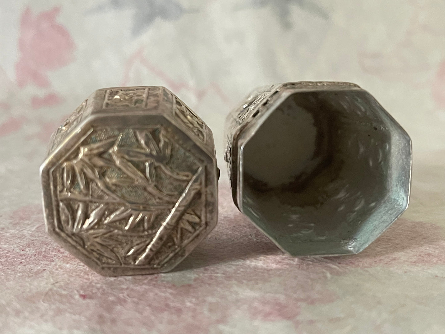 An antique octagonal shaped silver box with lid from south east Asia.