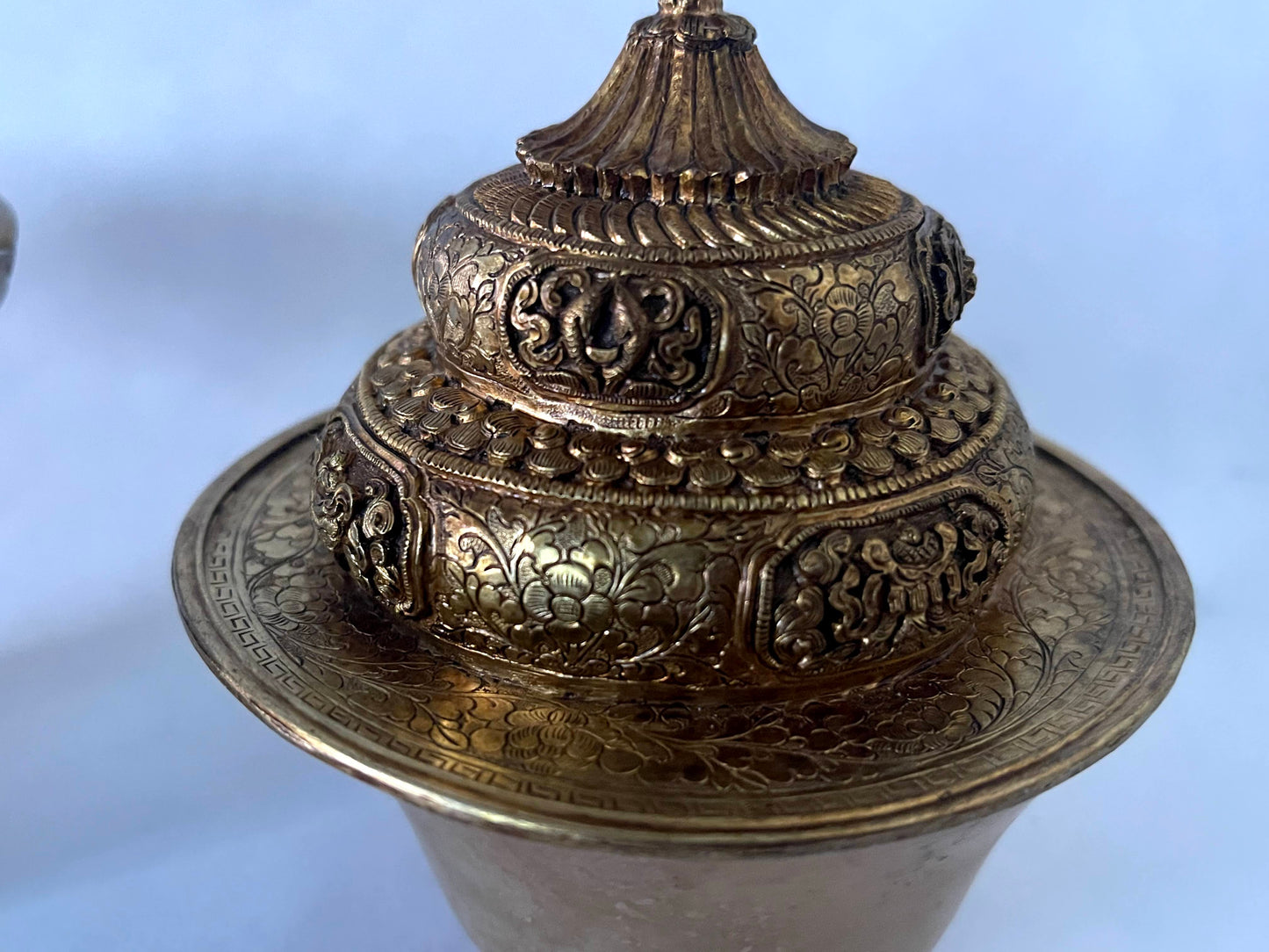 A vintage Gilt silver Tibetan cup stand