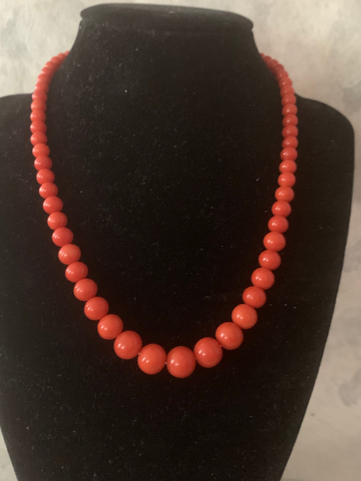 A 16” long antique coral necklace