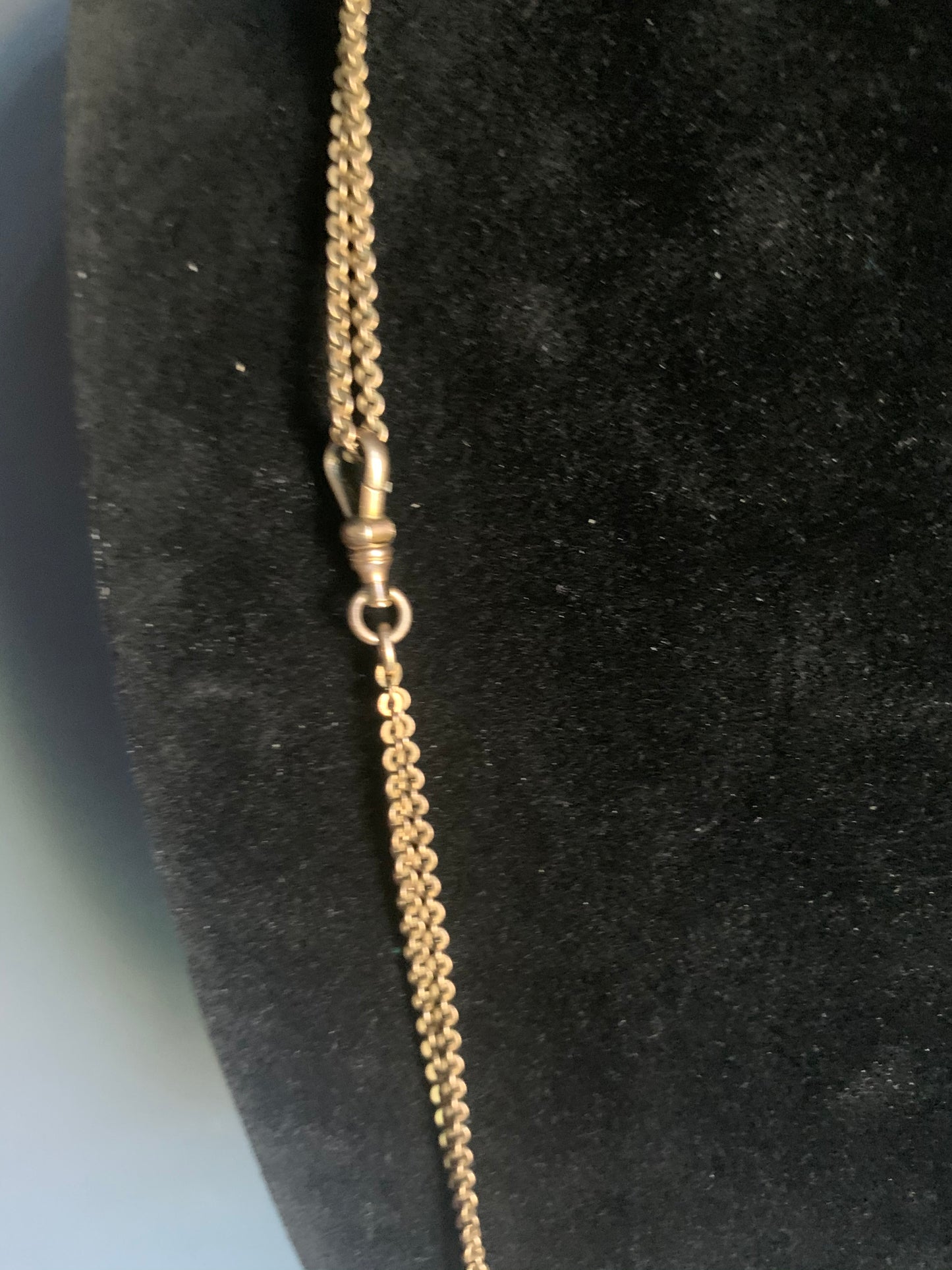 A jade and gold necklace