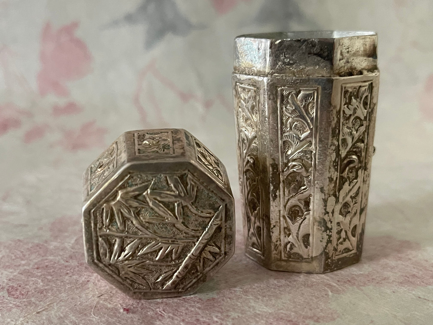 An antique octagonal shaped silver box with lid from south east Asia.
