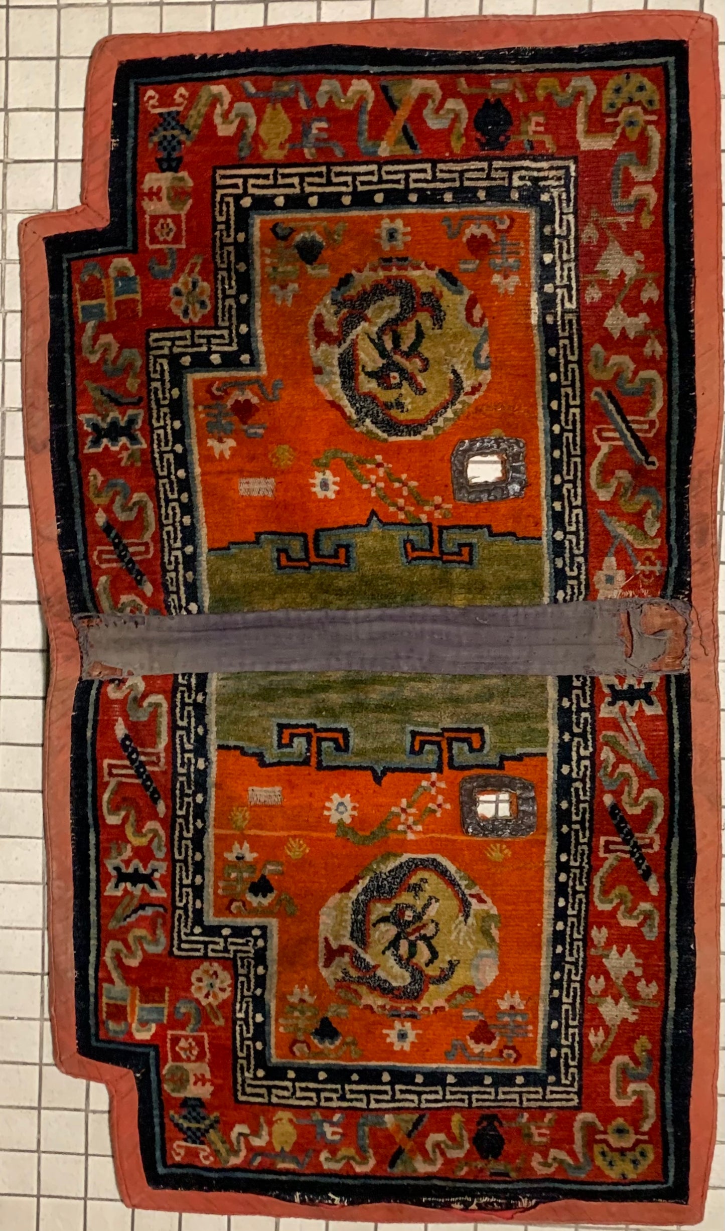 An antique Tibetan saddle rug