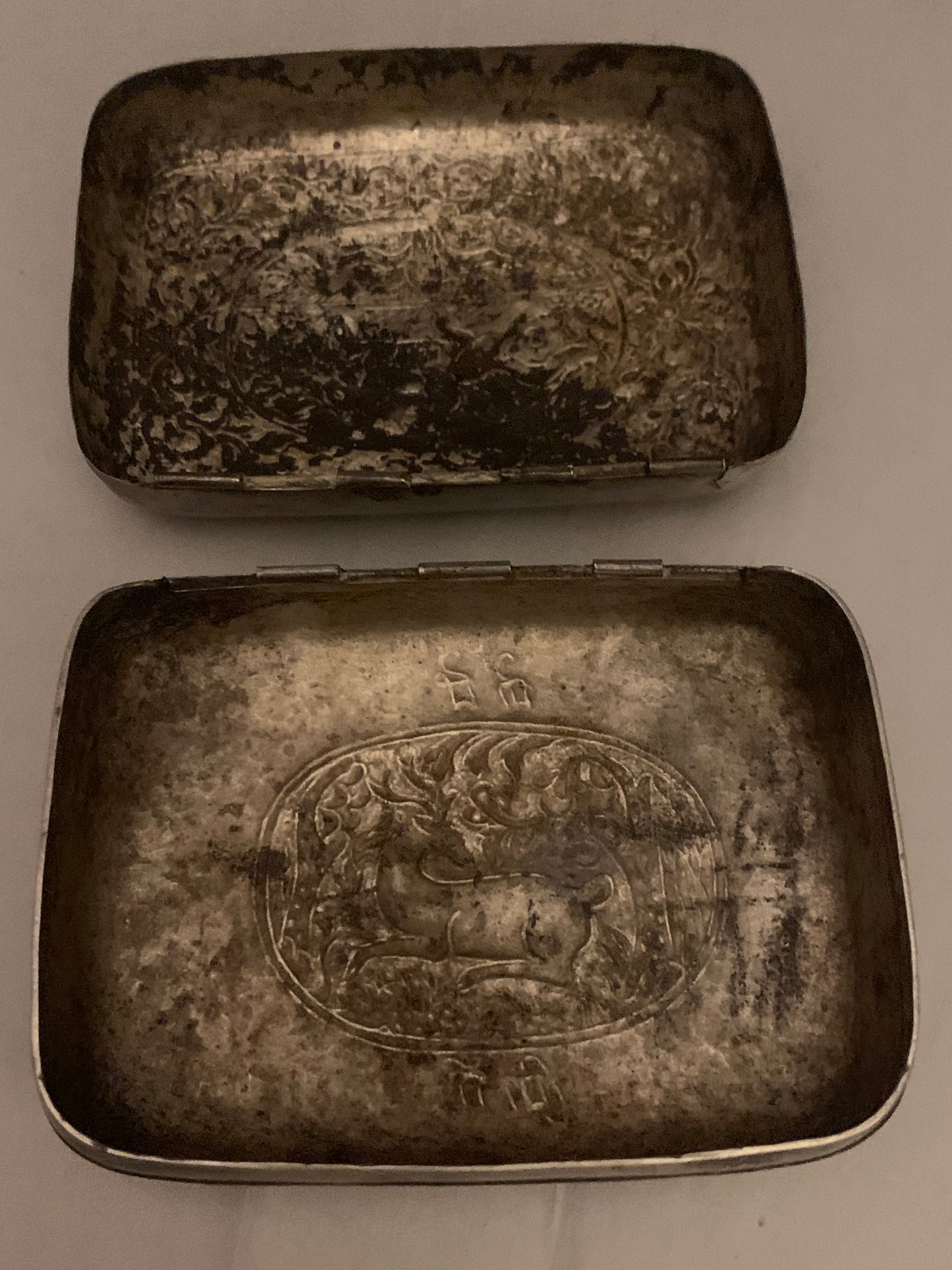 A silver repousse box