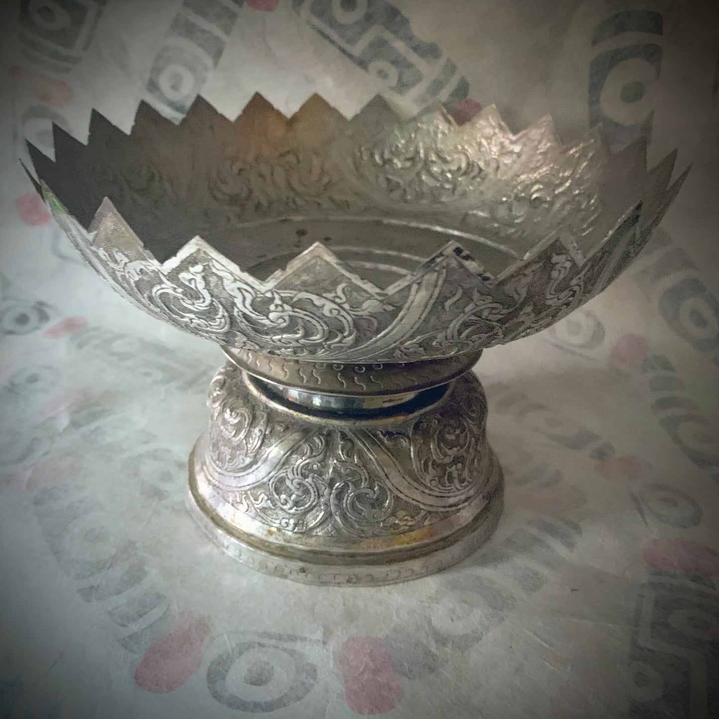 An antique silver fruit bowl stand
