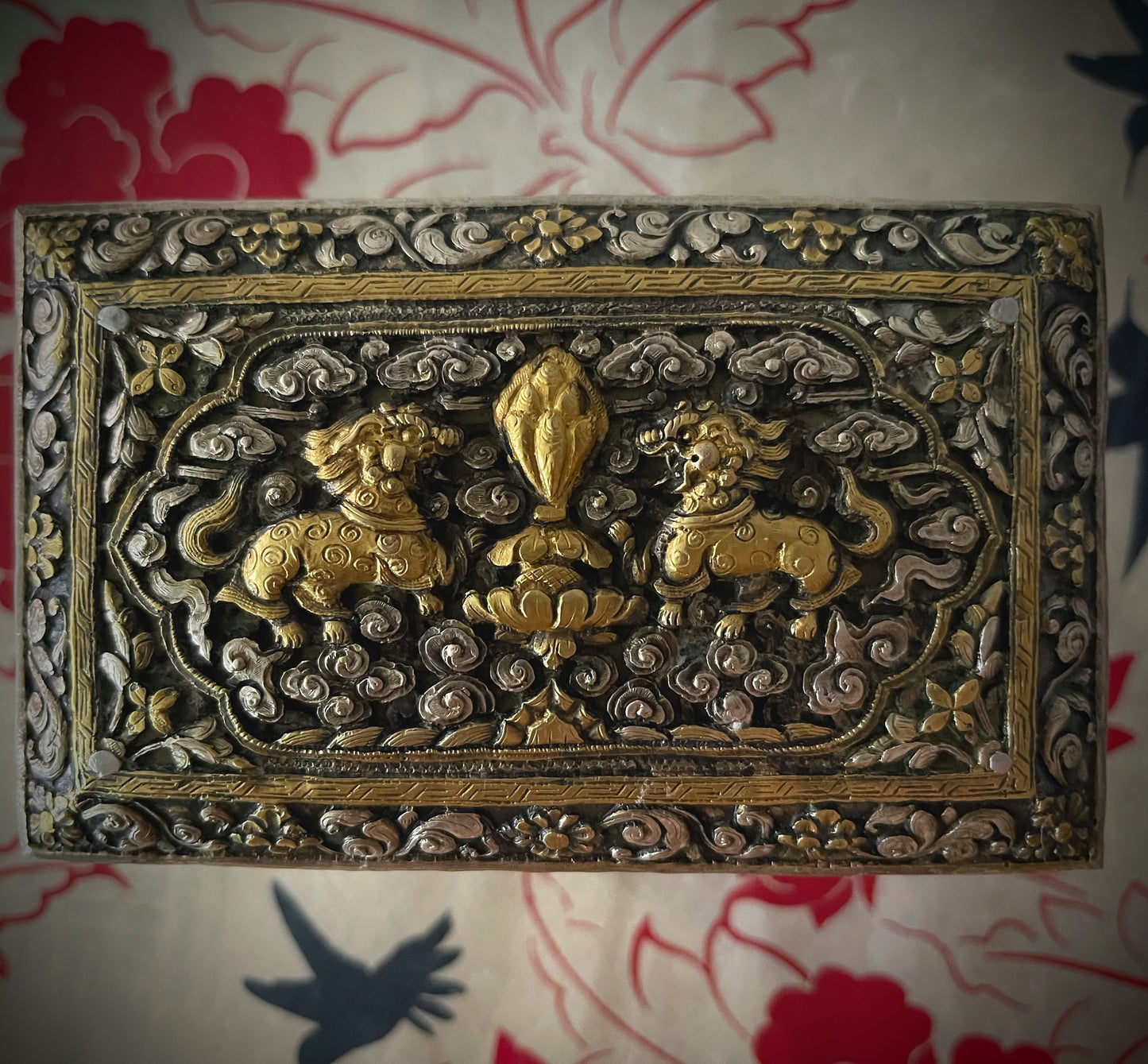 An antique carved Silver and gilded silver Bhutanese betel nut box