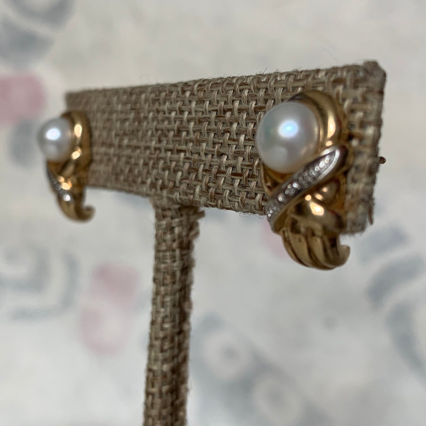 A pair of vintage pearl earrings
