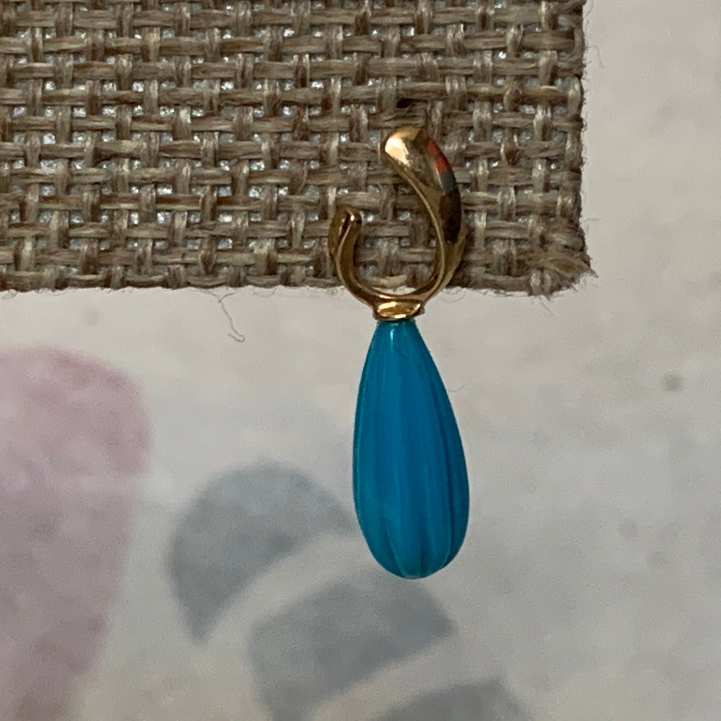 A pair of turquoise earrings