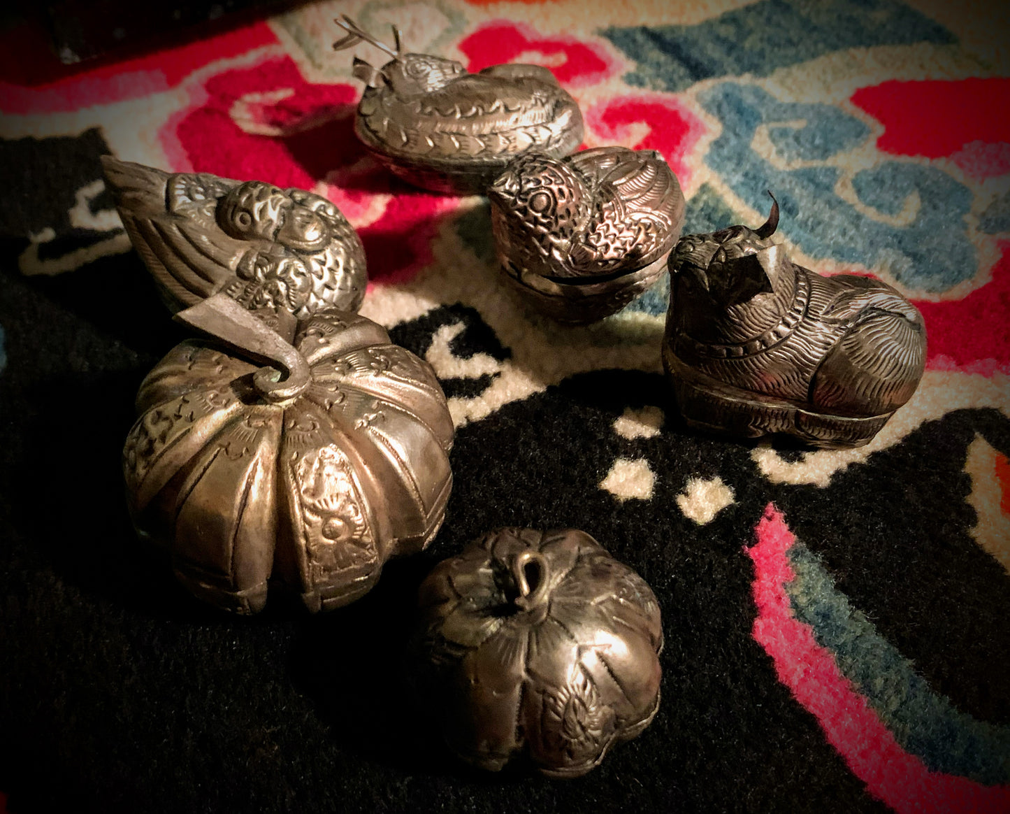 A collection of silvered boxes