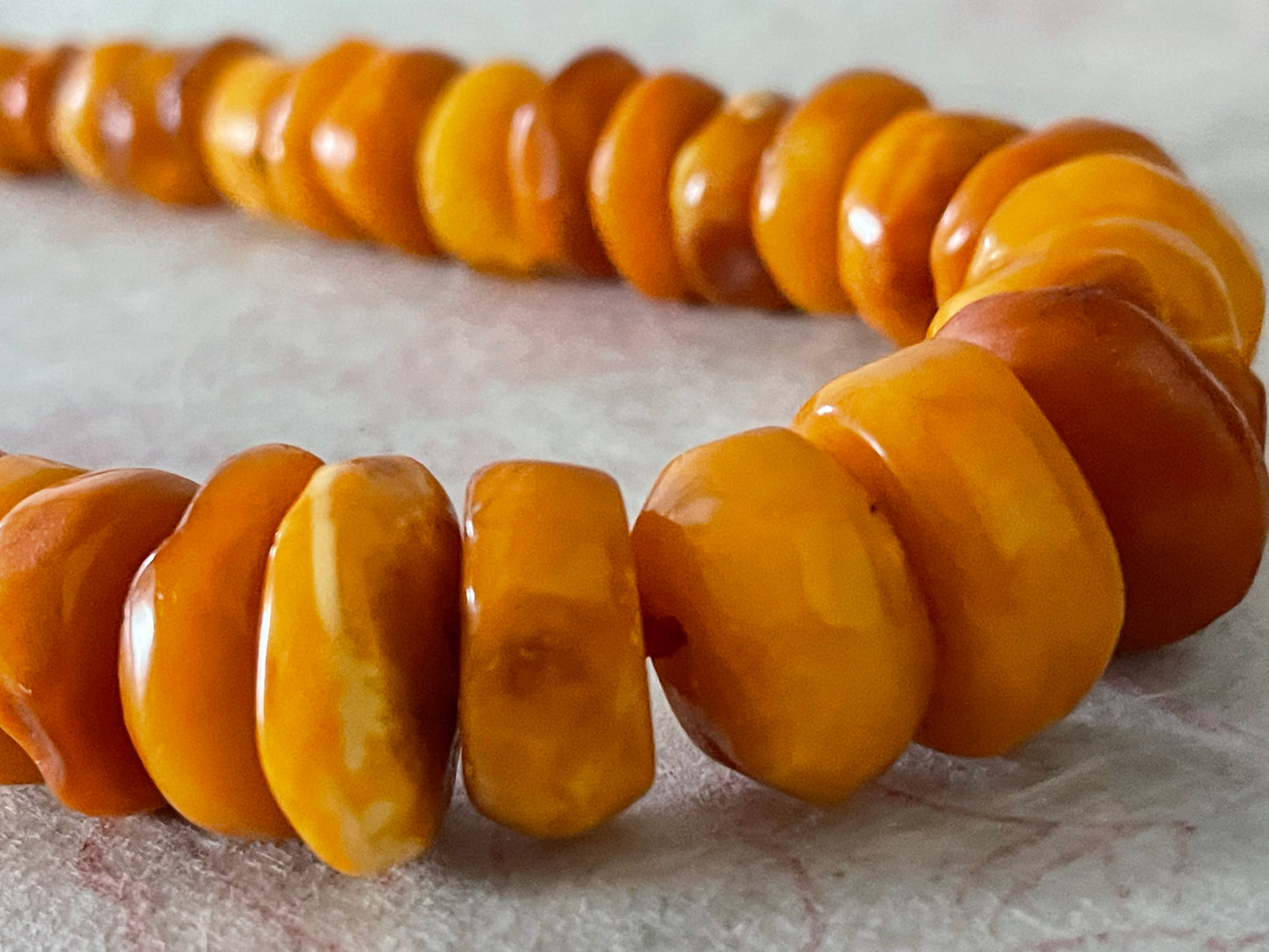 A vintage butterscotch amber bead necklace