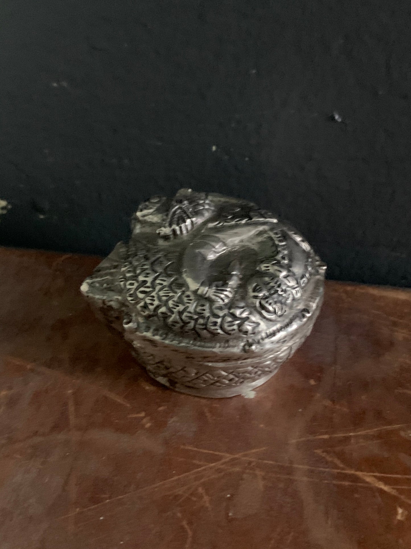 A silver pill box