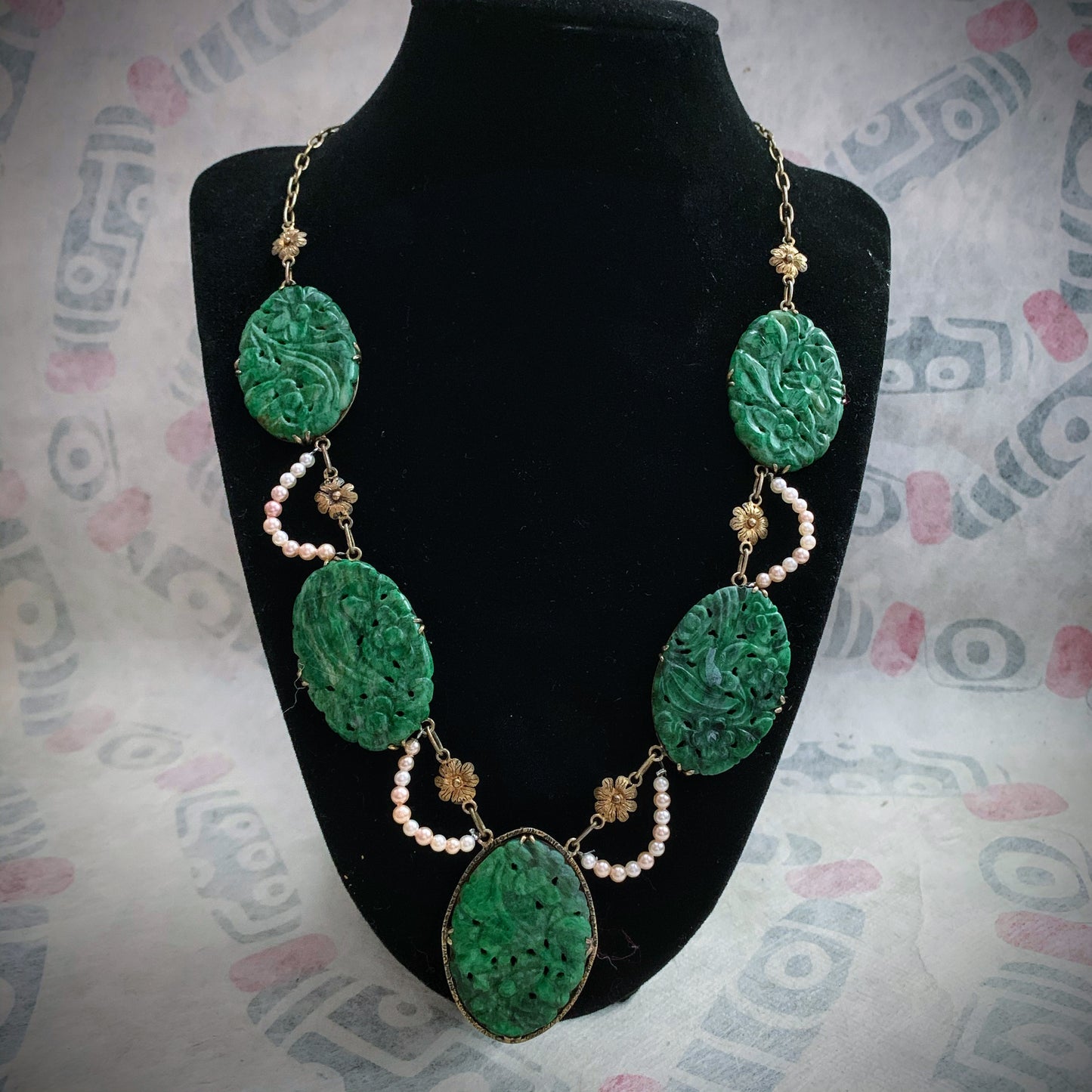 A spinach green jade necklace