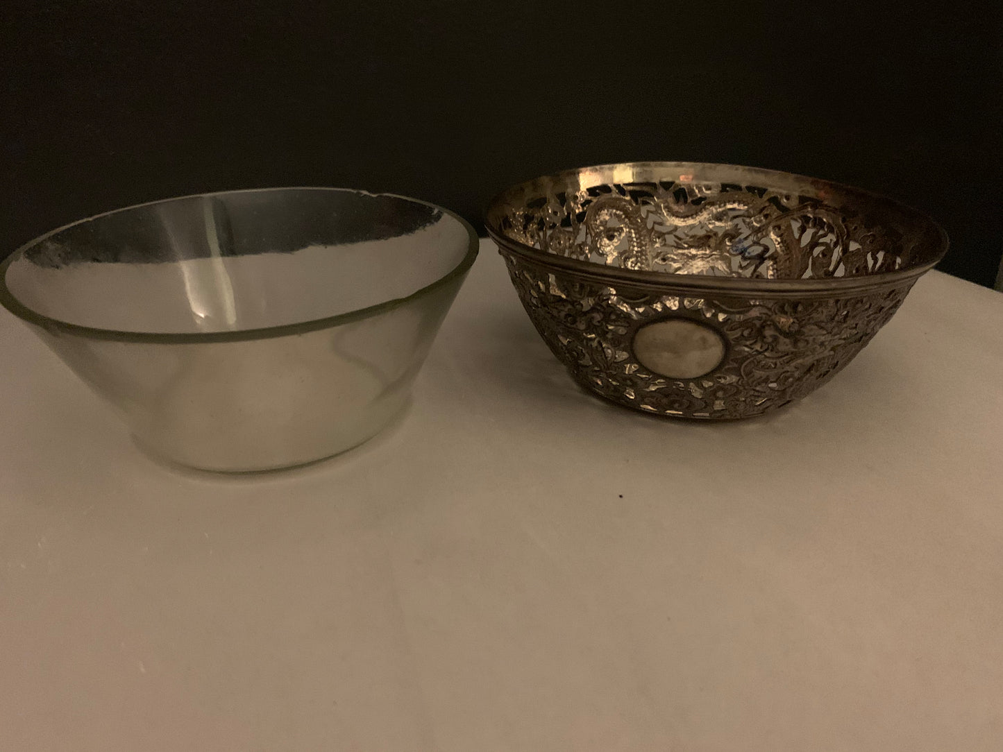 A silver bowl sleeve