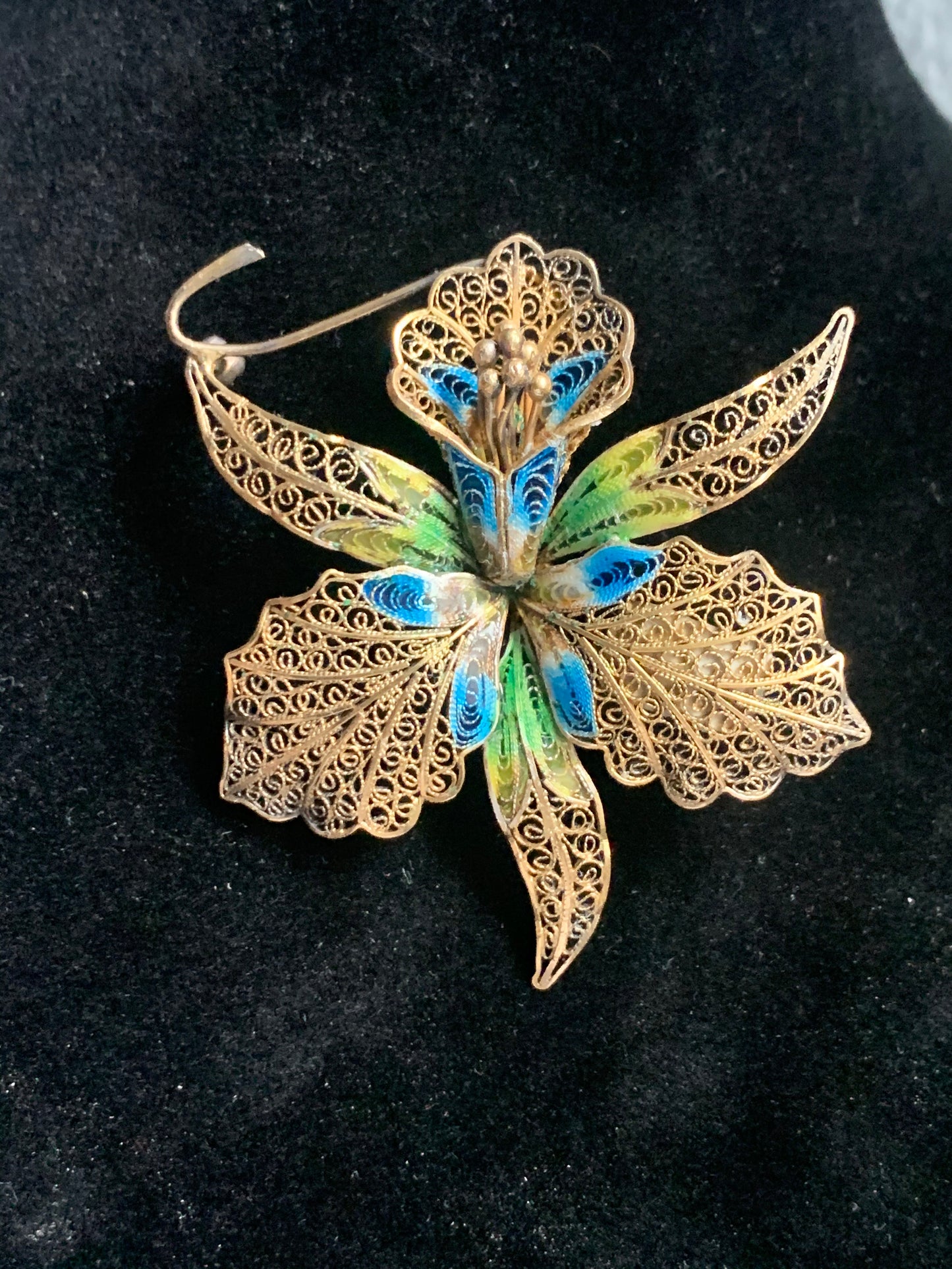 A filigree/ enamel Florence-orchid brooch