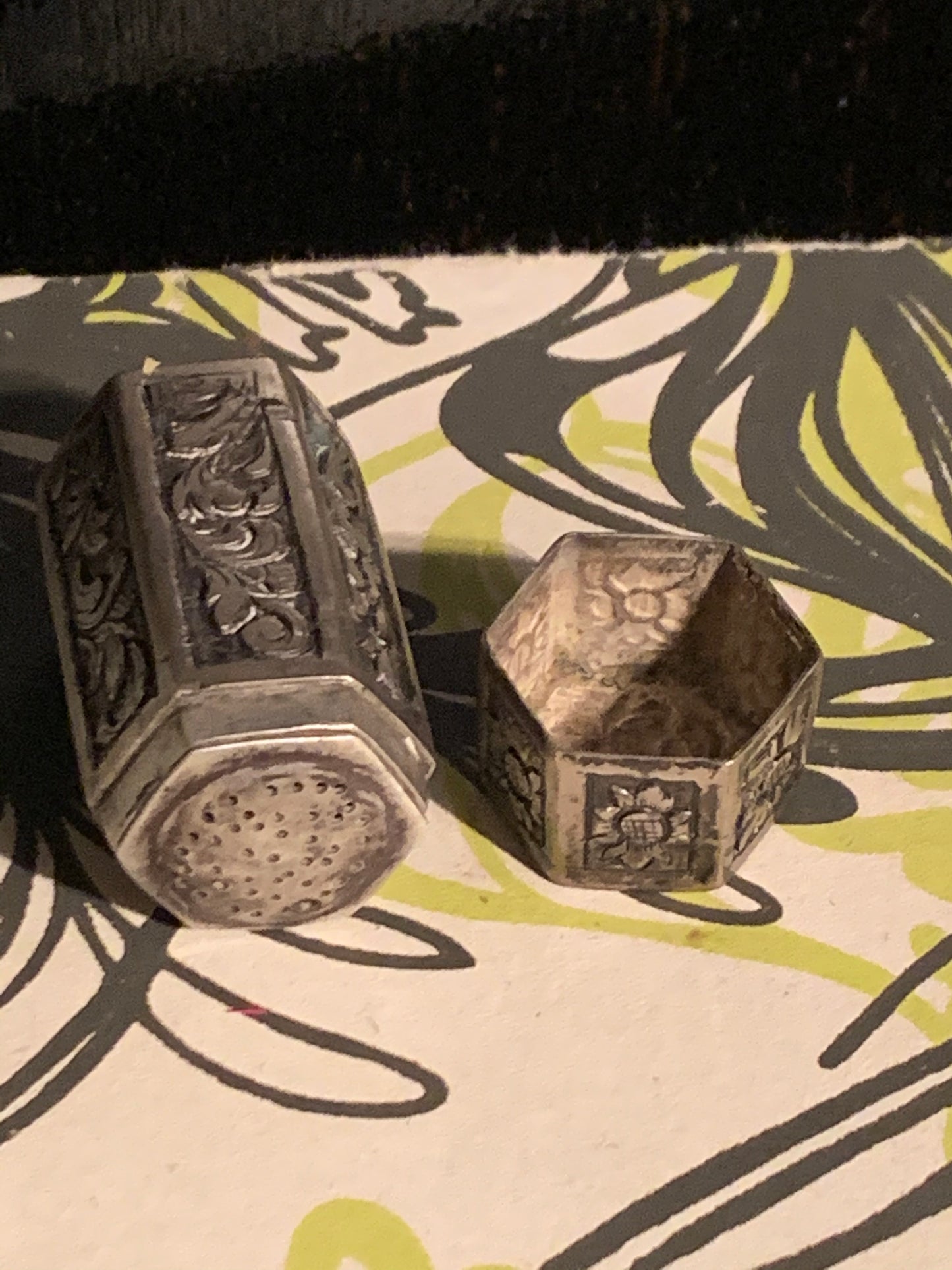A vintage silver salt shaker