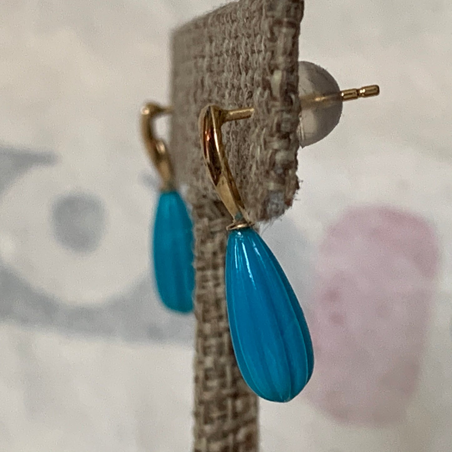 A pair of turquoise earrings