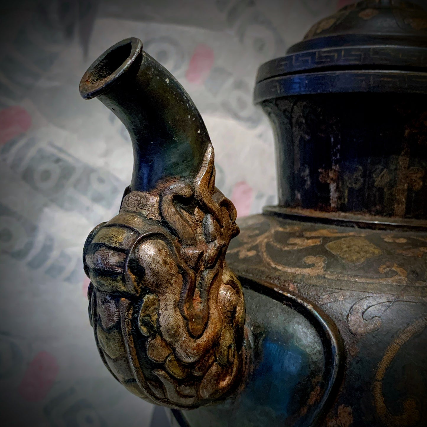 An antique Tibetan iron and silver teapot