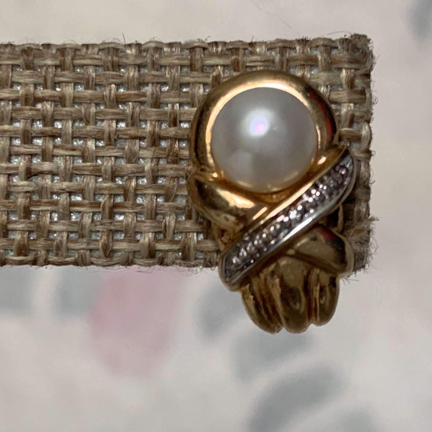 A pair of vintage pearl earrings