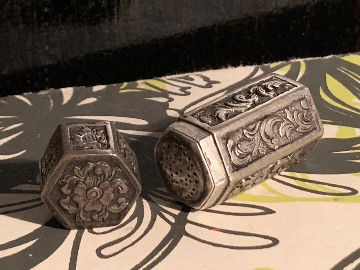 A vintage silver salt shaker