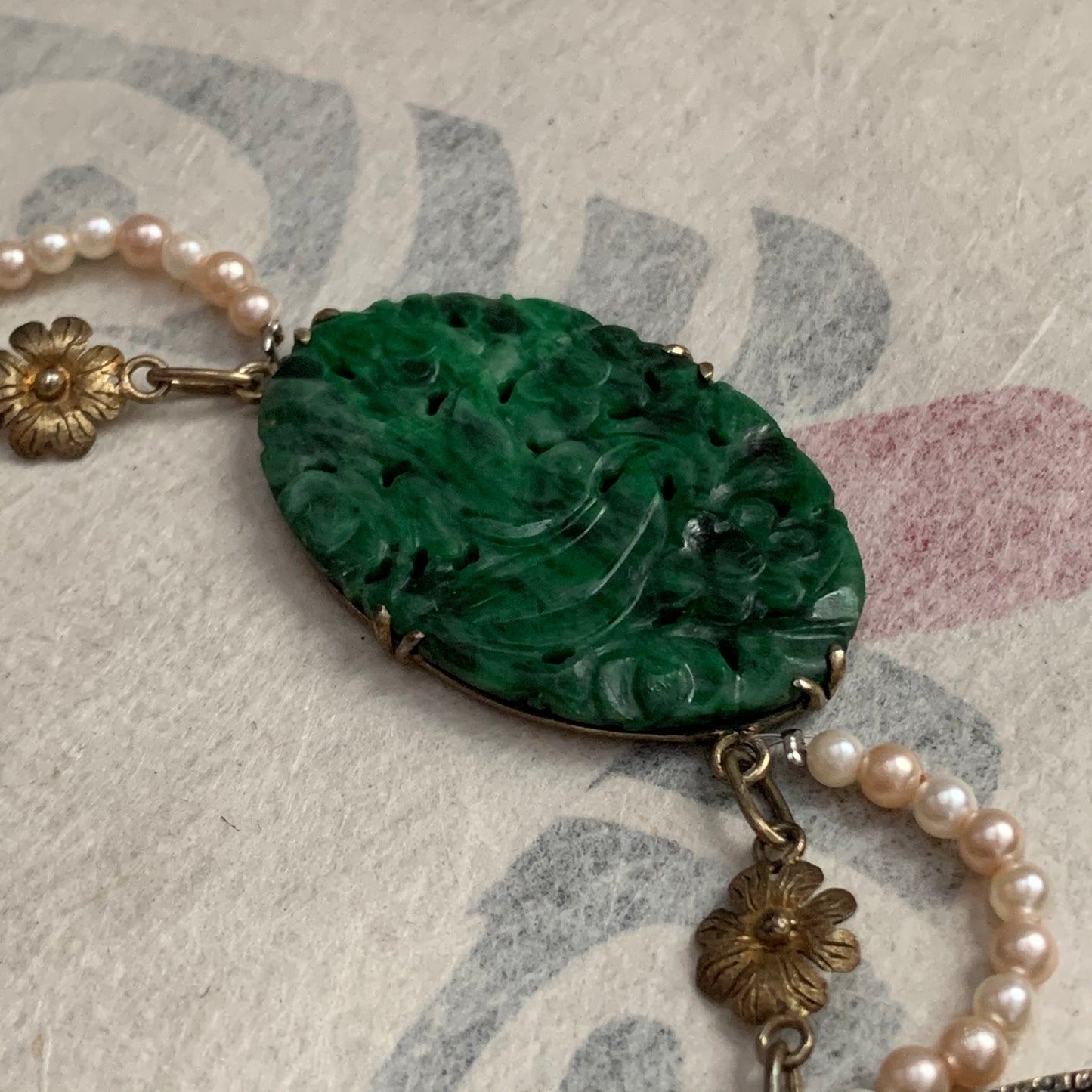 A spinach green jade necklace