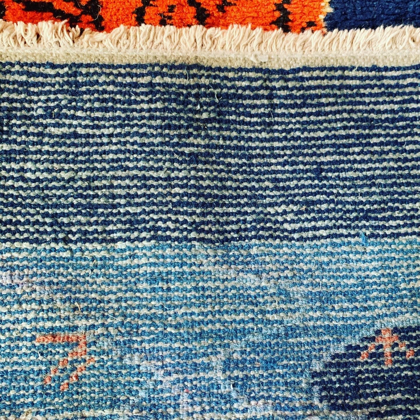 A vintage Tibetan Tiger carpet