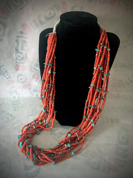 A vintage Native American coral and turquoise necklace