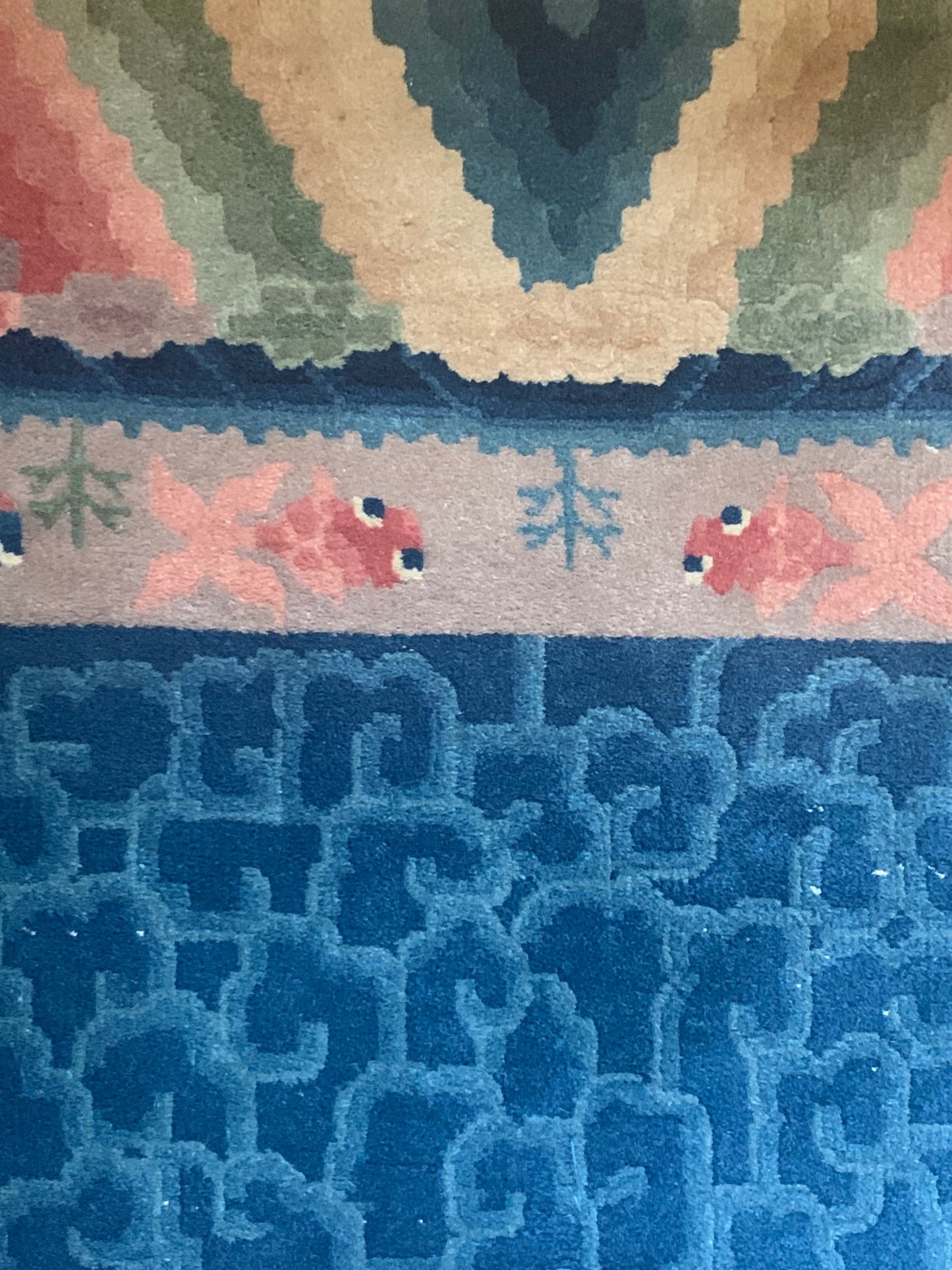 An antique Chinese dragon rug