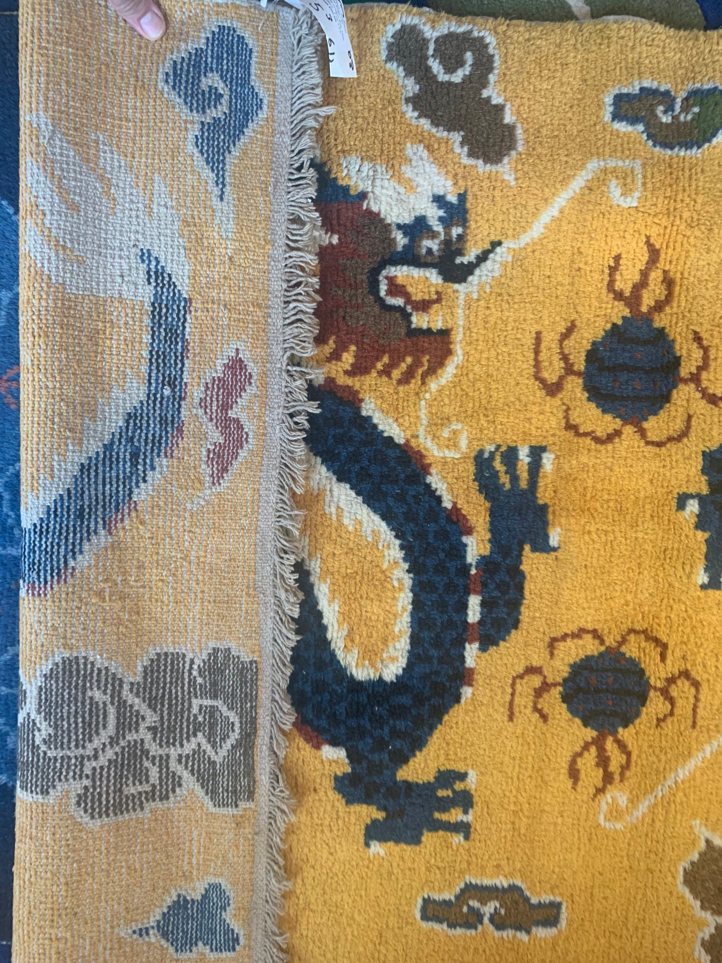 A vintage Tibetan dragon carpet