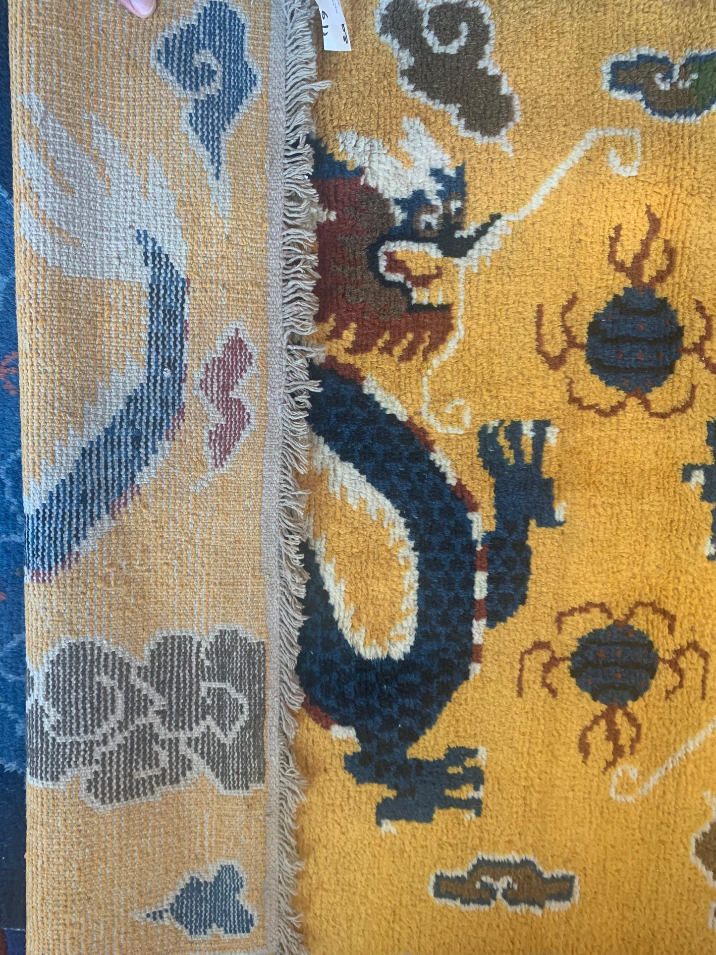 A vintage Tibetan dragon carpet
