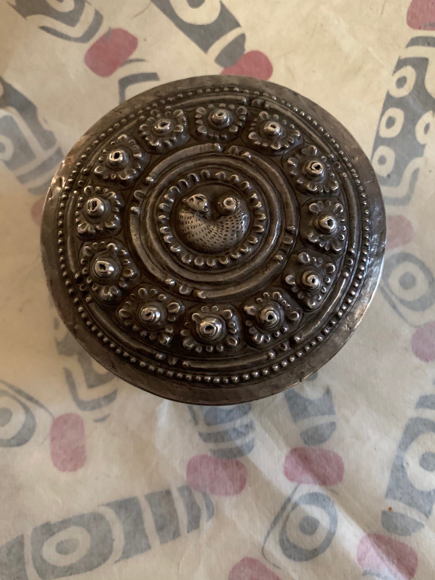 An antique silver incense box with lid